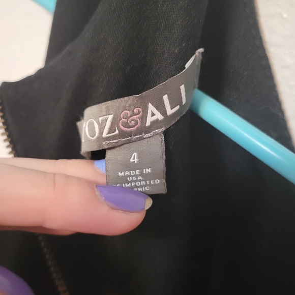 Elegant Black and Cream Sleeveless Dress - Picture 6 of 9